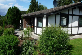 Гостиница Ferienhaus Henneseeblick  Мешеде